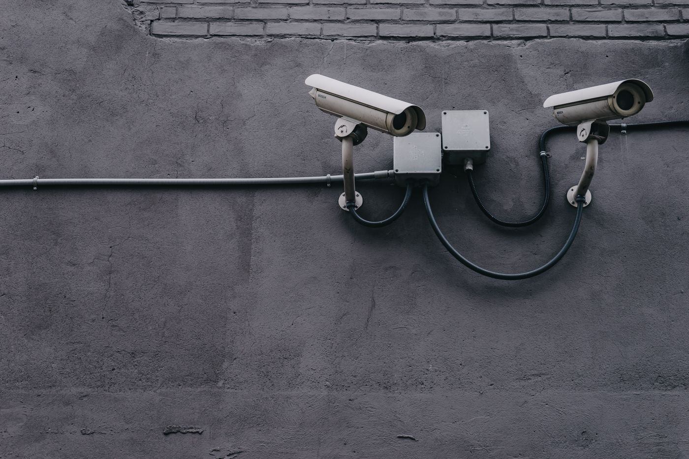 Security camera monitoring a commercial premises
